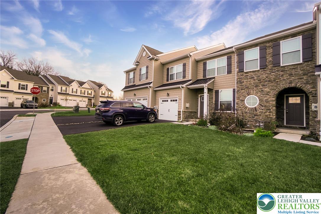 164 Maureen Lane Allentown, PA 18104 - Photo 2 of 28 a front view of a house with garden