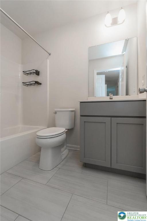 164 Maureen Lane Allentown, PA 18104 - Photo 24 of 28 a bathroom with a toilet sink and mirror