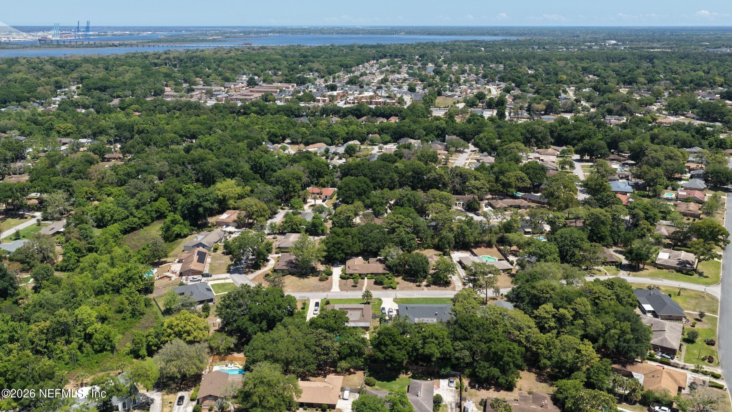 3371 Debussy Road Jacksonville, FL 32277 - Photo 8 of 21 DJI_20260423140014_0008_D