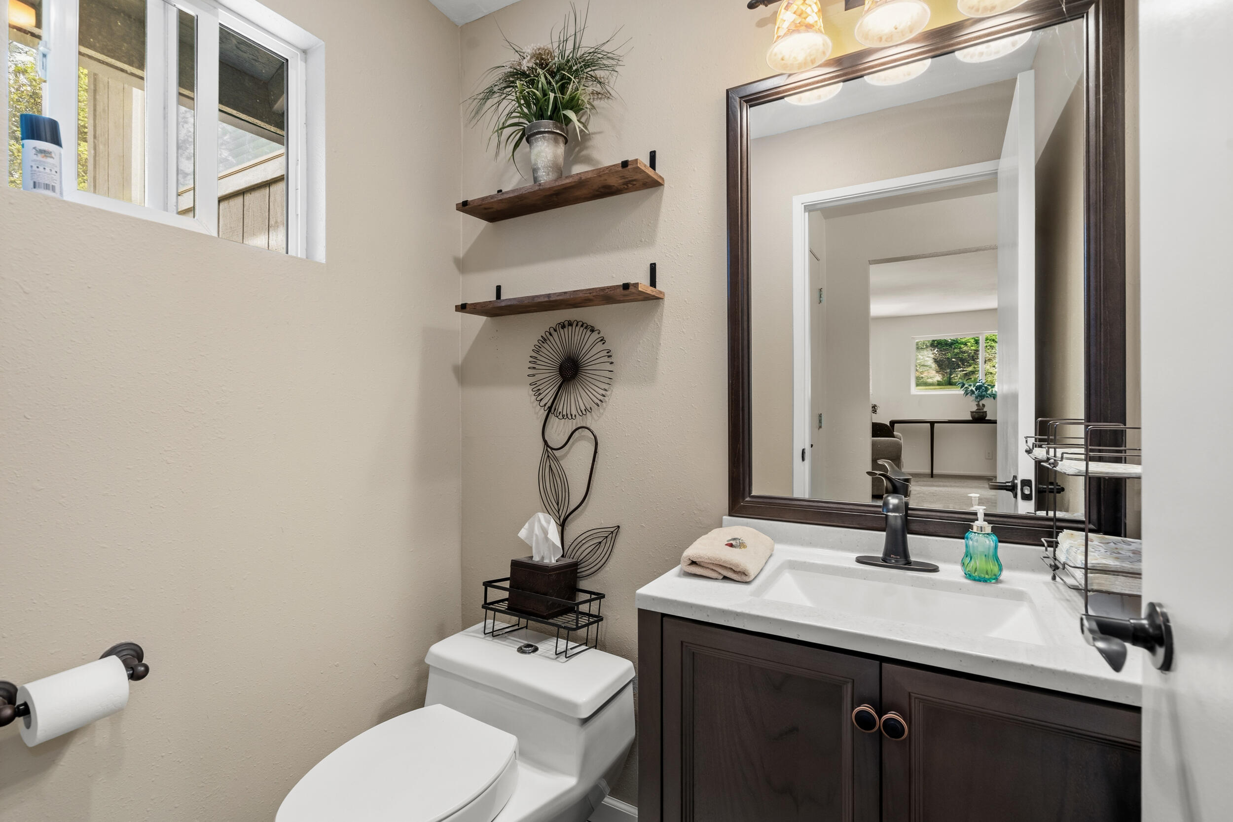 3268 Humbug Creek Road Jacksonville, OR 97530 - Photo 17 of 36 a bathroom with a sink toilet and mirror