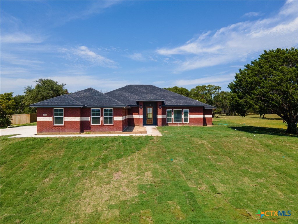 3025 Millhouse Road Copperas Cove, TX 76522 - Photo 1 of 38 a front view of a house with yard