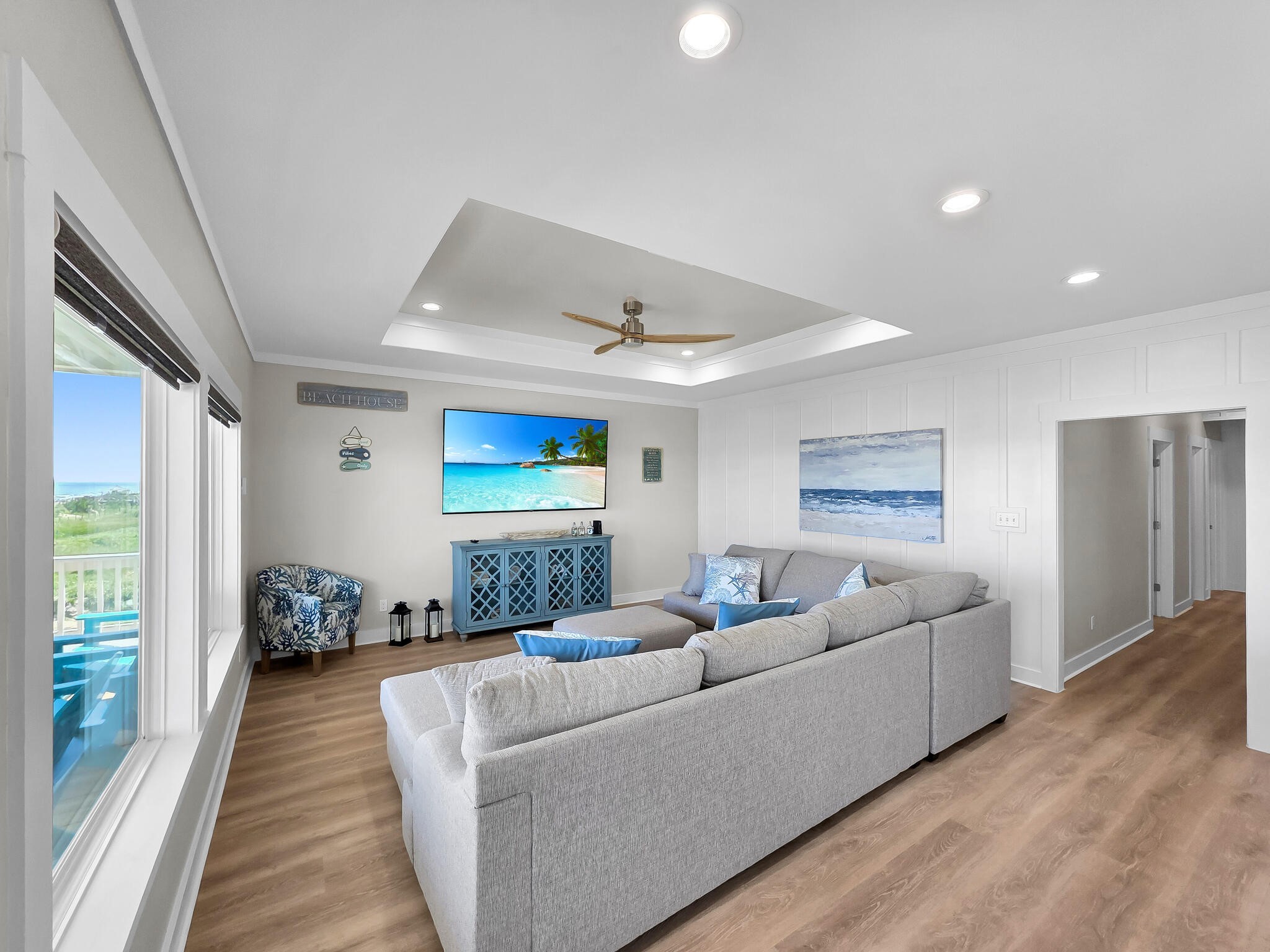 1215 Gulf Road Crystal Beach, TX 77650 - Photo 13 of 34 a living room with furniture and a wooden floor