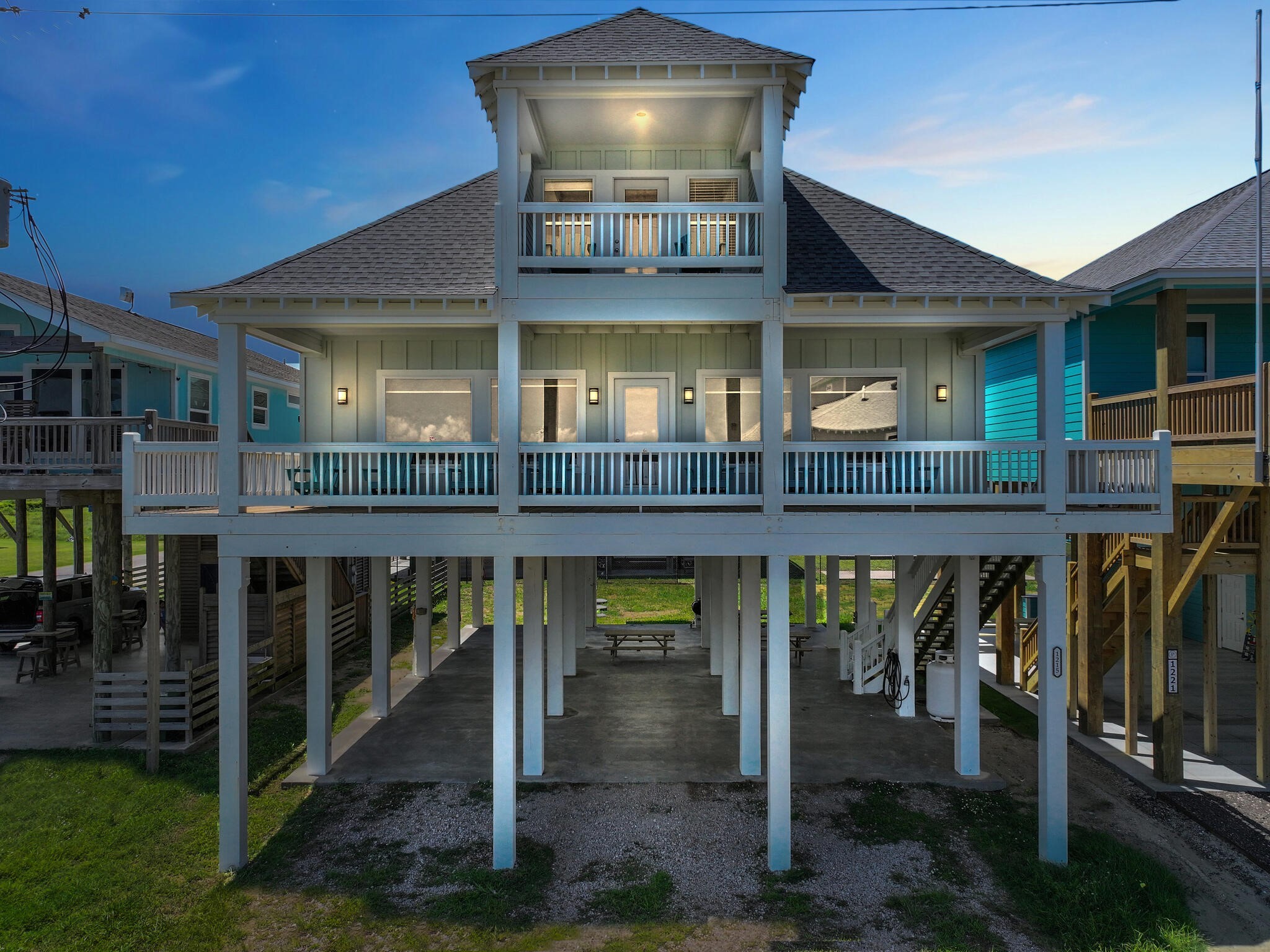 1215 Gulf Road Crystal Beach, TX 77650 - Photo 30 of 34 a view of a building with a balcony