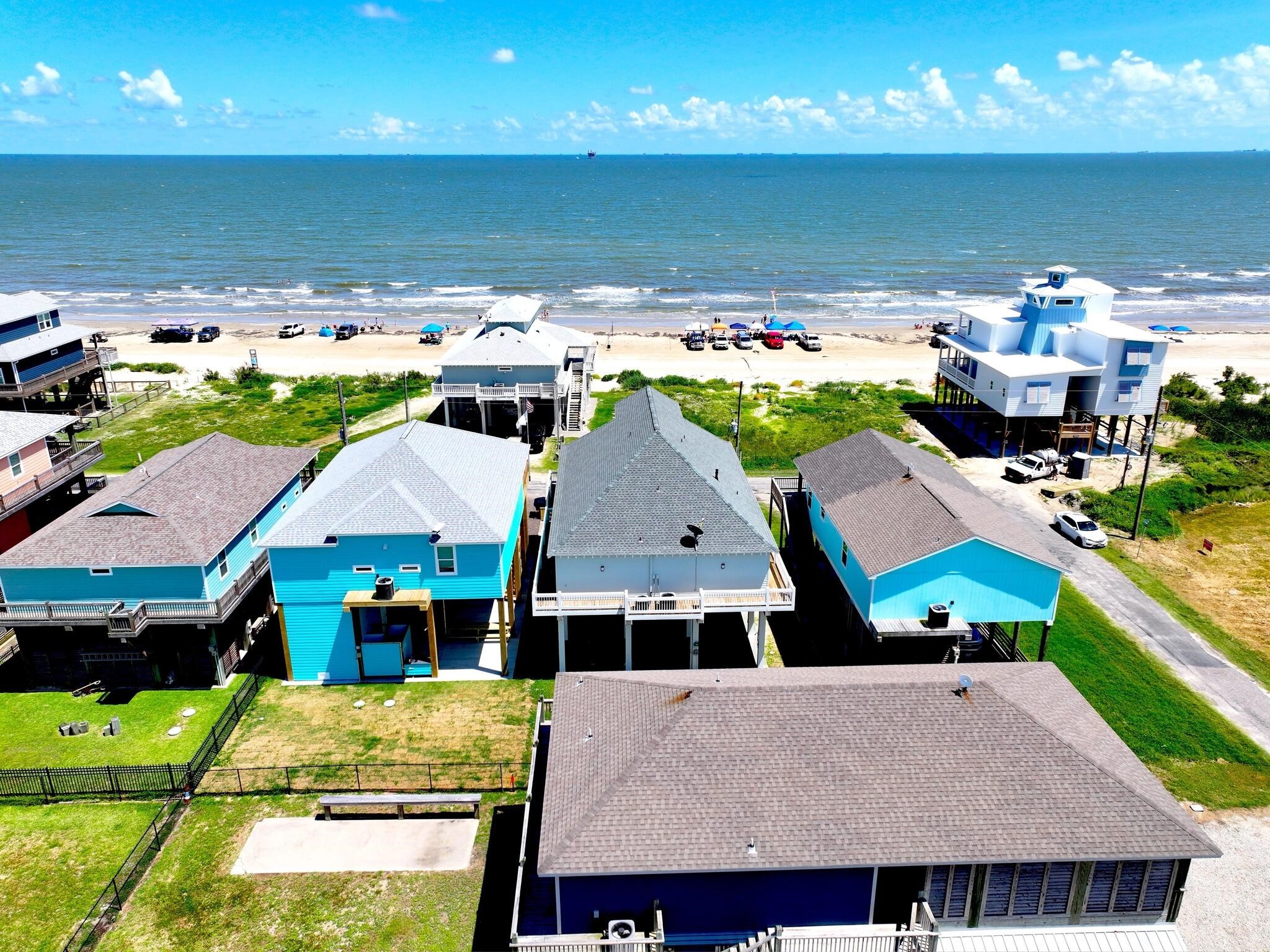 1215 Gulf Road Crystal Beach, TX 77650 - Photo 4 of 34 a aerial view of a house with a swimming pool