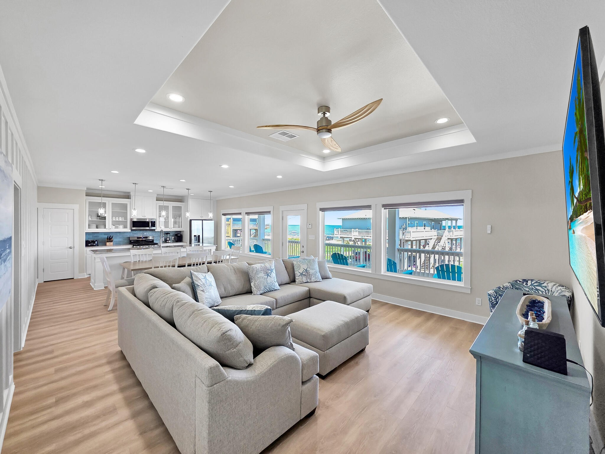1215 Gulf Road Crystal Beach, TX 77650 - Photo 9 of 34 a living room with furniture and a large window