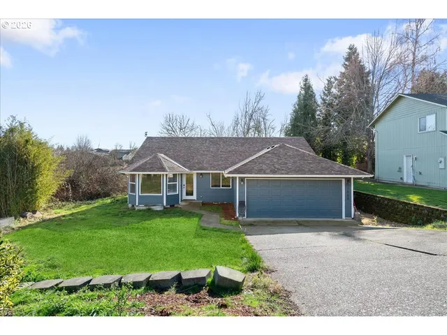 a house view with a garden space