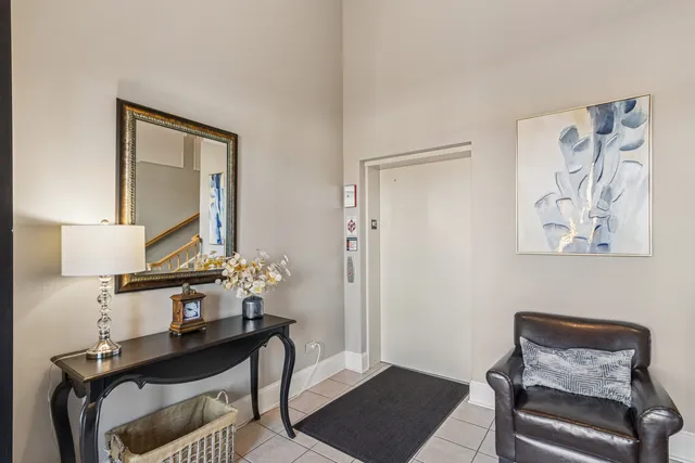 a view of room with furniture and wooden floor