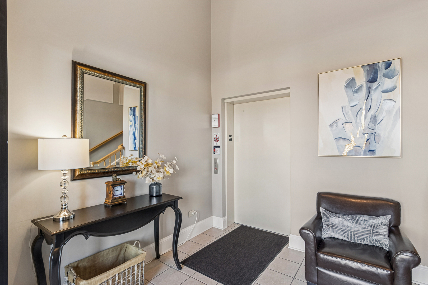 271 East Railroad Avenue, Unit 302 Bartlett, IL 60103 - Photo 3 of 21 a view of room with furniture and wooden floor