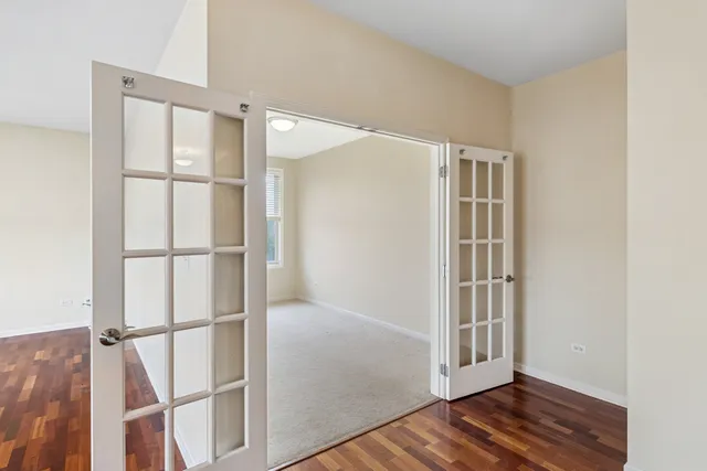 a view of entryway with wooden floor