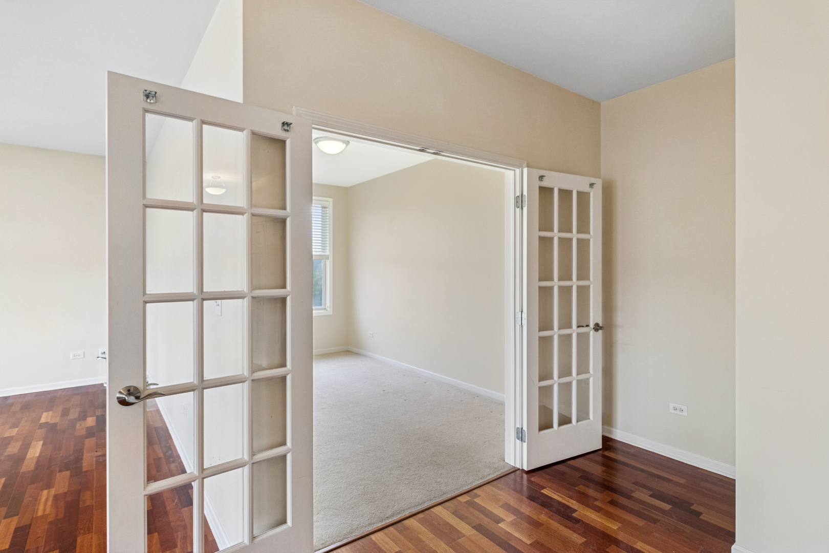 271 East Railroad Avenue, Unit 302 Bartlett, IL 60103 - Photo 9 of 21 a view of entryway with wooden floor