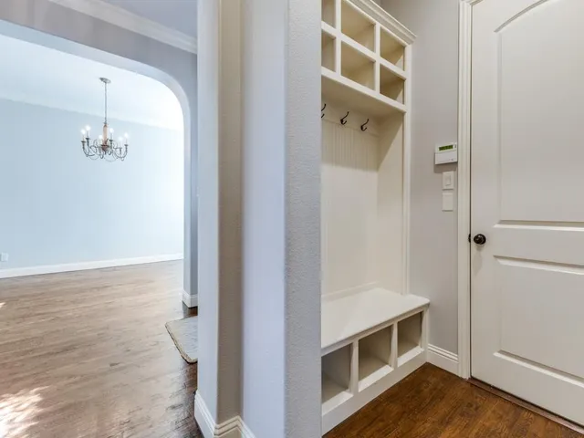 a bathroom with a double vanity sink and mirror