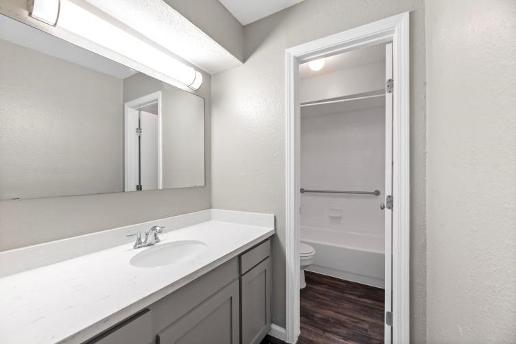 935 Byrne Street, Unit B23 Houston, TX 77009 - Photo 5 of 28 a bathroom with a sink double vanity and a mirror