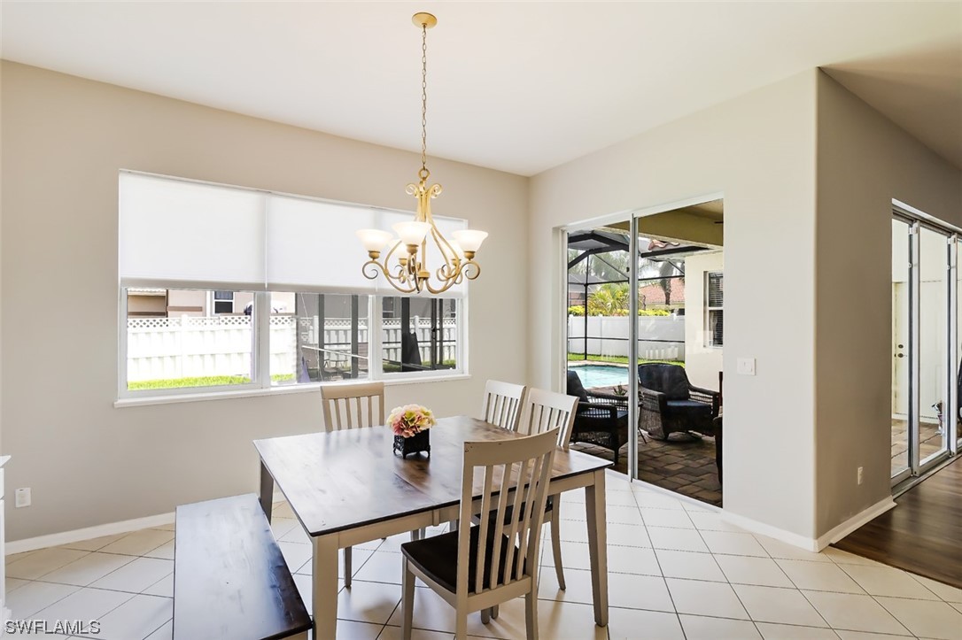 12893 Timber Ridge Drive Fort Myers, FL 33913 - Photo 15 of 30 a view of a dining room with furniture window and outside view