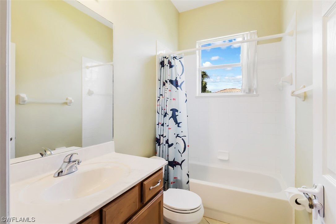 12893 Timber Ridge Drive Fort Myers, FL 33913 - Photo 23 of 30 a bathroom with a sink a toilet and shower