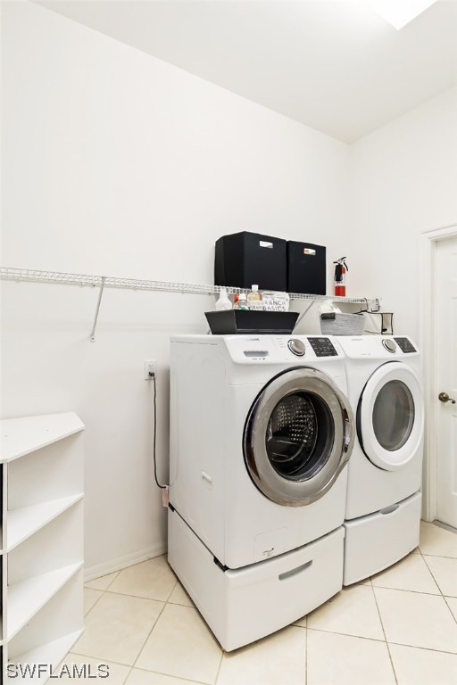 12893 Timber Ridge Drive Fort Myers, FL 33913 - Photo 5 of 30 a utility room with dryer and washer