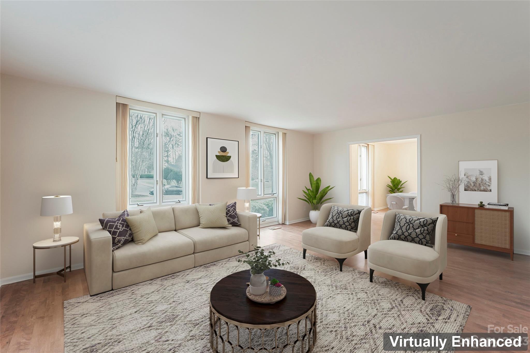 4810 Rounding Run Road Charlotte, NC 28277 - Photo 15 of 42 a living room with furniture a rug and a window