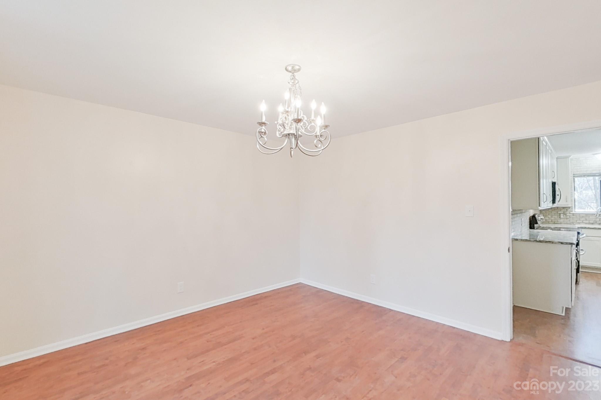4810 Rounding Run Road Charlotte, NC 28277 - Photo 17 of 42 a view of a chandelier in big room
