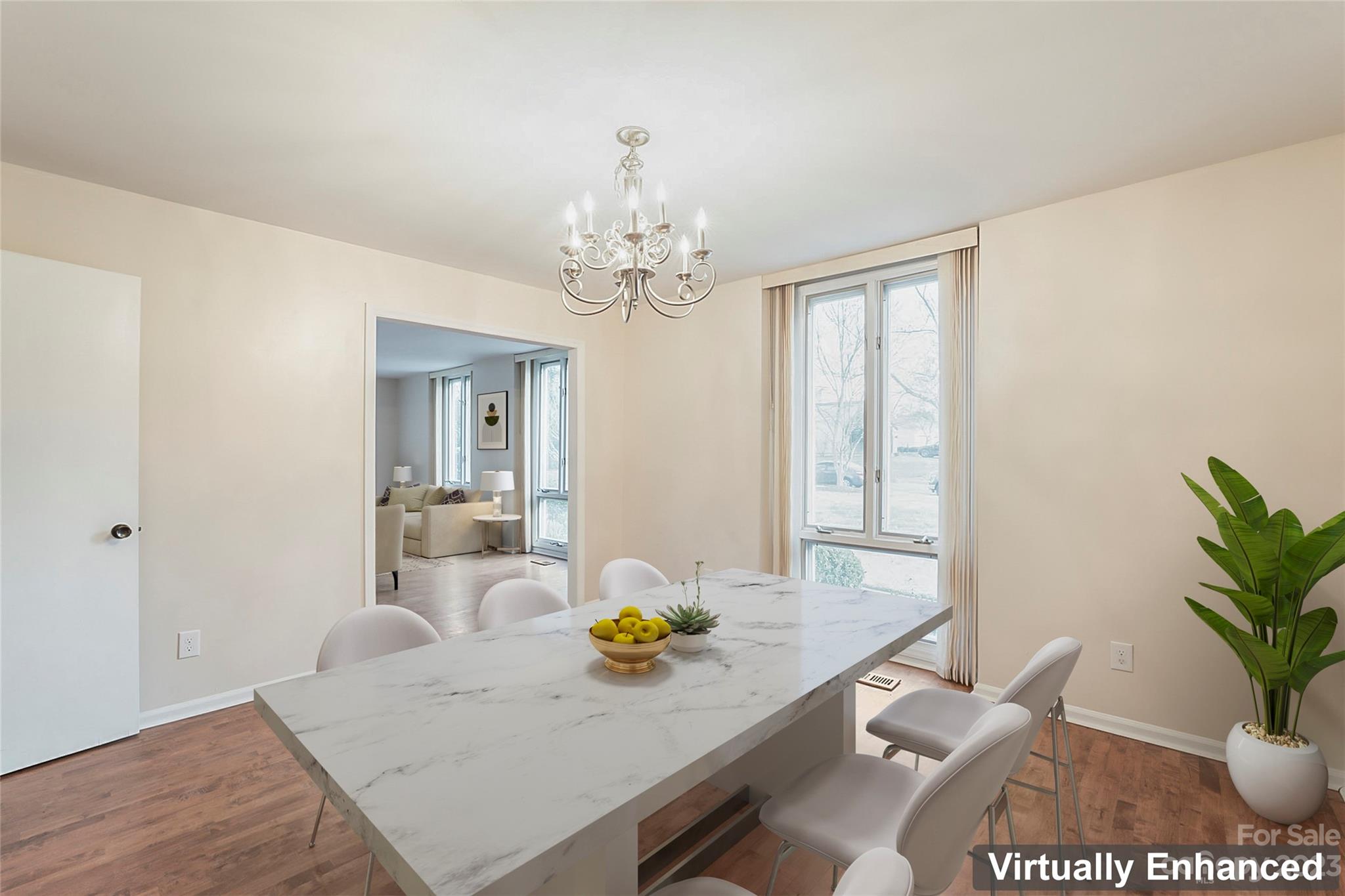 4810 Rounding Run Road Charlotte, NC 28277 - Photo 19 of 42 a view of a dining room with furniture and a potted plant
