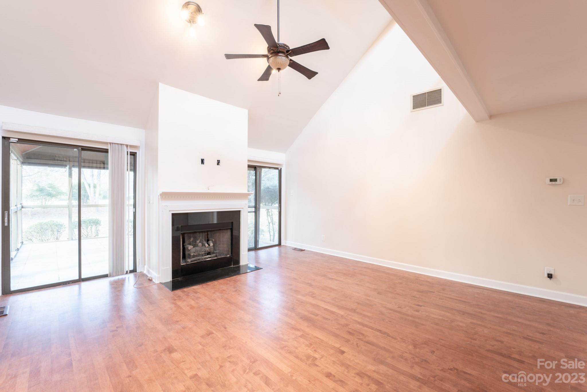 4810 Rounding Run Road Charlotte, NC 28277 - Photo 26 of 42 an empty room with fan and windows