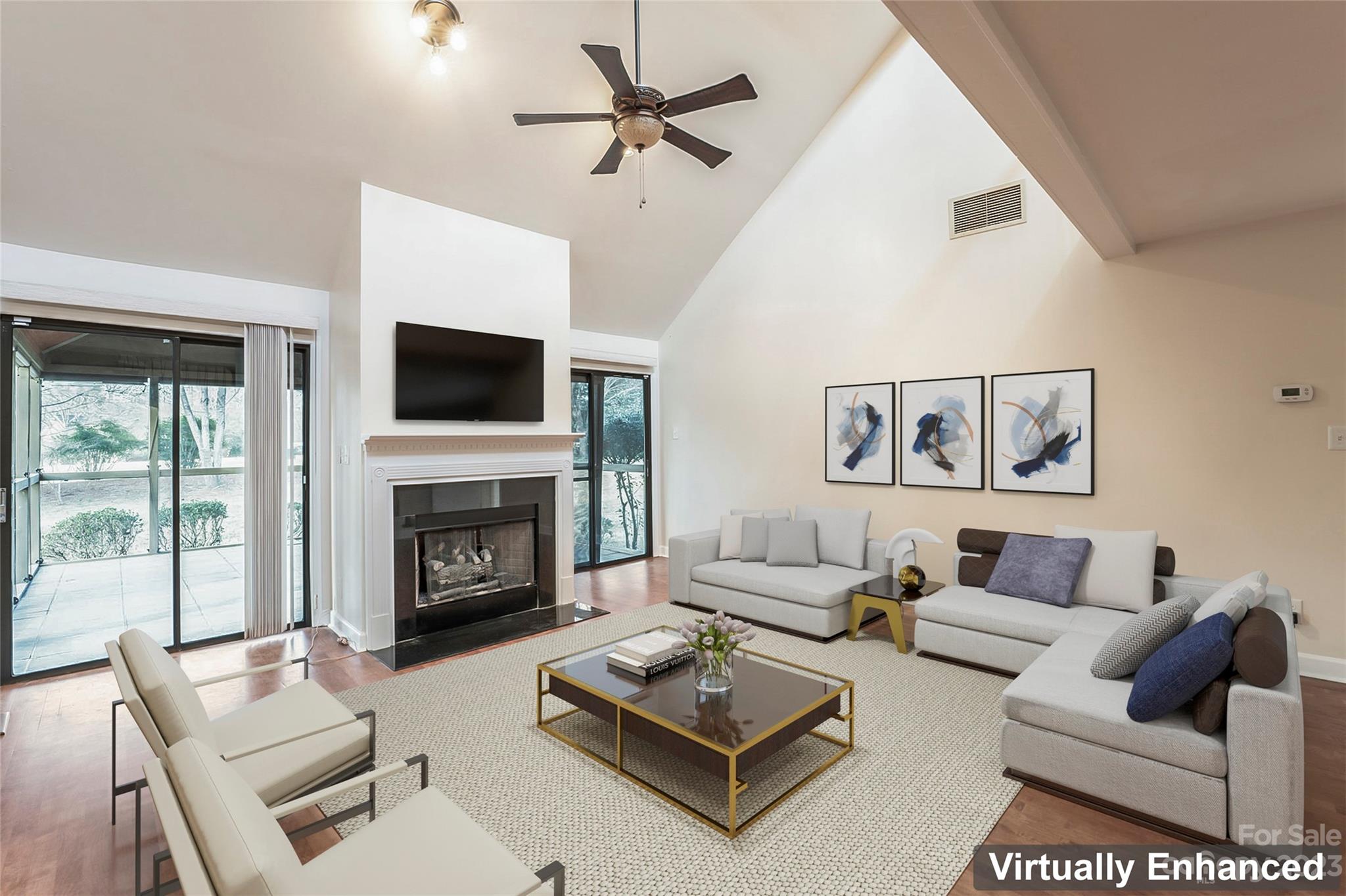 4810 Rounding Run Road Charlotte, NC 28277 - Photo 27 of 42 a living room with furniture a fireplace with a flat screen tv and next to a window