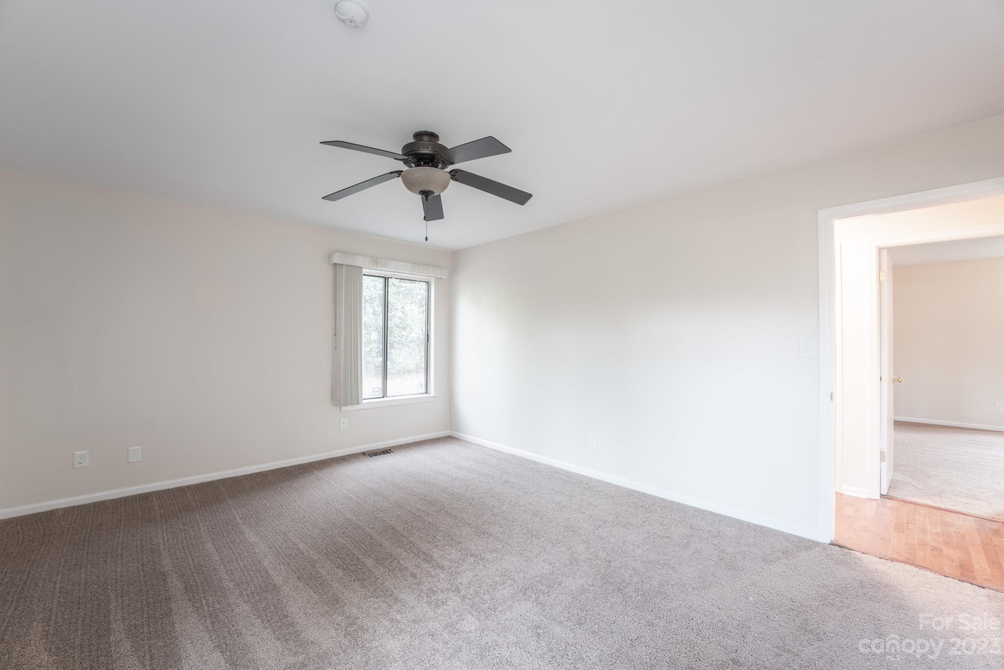 4810 Rounding Run Road Charlotte, NC 28277 - Photo 30 of 42 a view of an empty room with a window