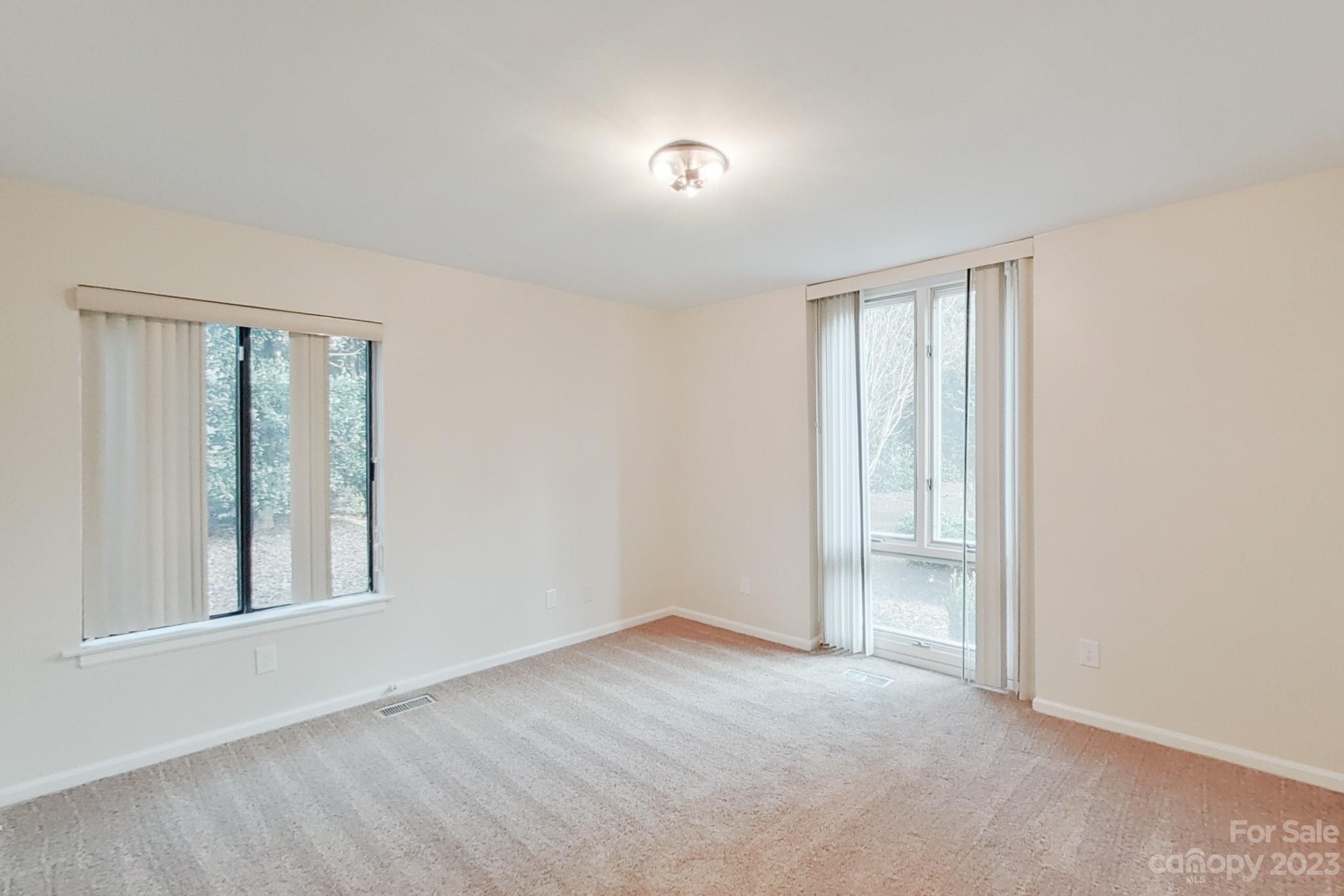 4810 Rounding Run Road Charlotte, NC 28277 - Photo 36 of 42 a view of an empty room with a window
