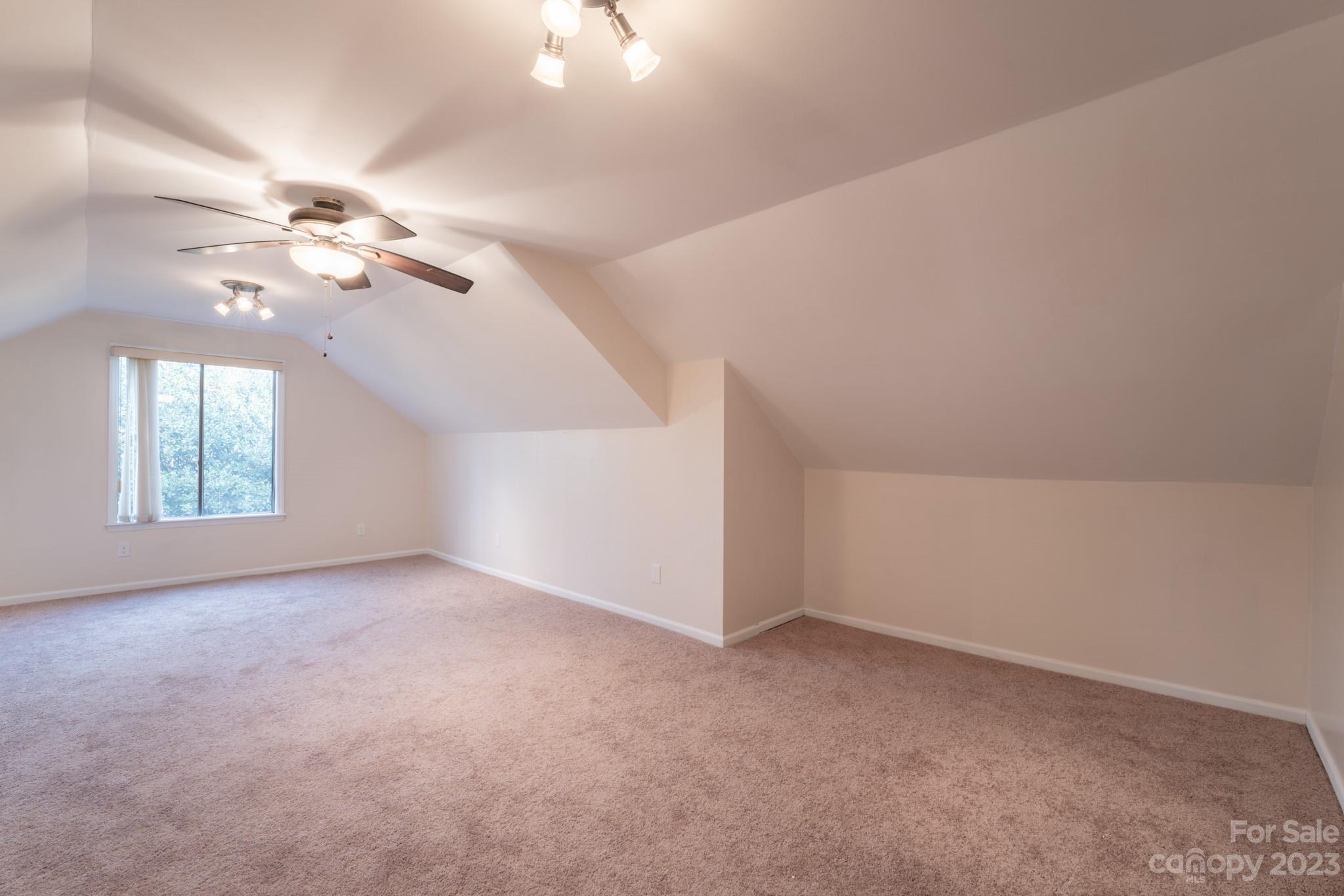 4810 Rounding Run Road Charlotte, NC 28277 - Photo 40 of 42 wooden floor in an empty room with a window