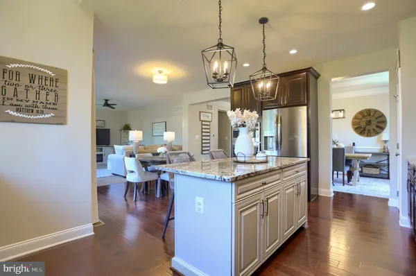a kitchen that has a sink and a stove