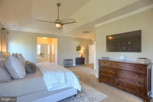 a view of a livingroom with furniture and a fireplace