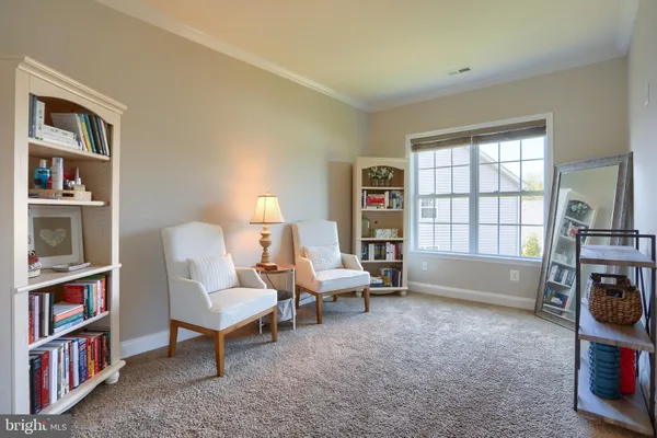 a spacious bathroom with a tub sink shower and mirror