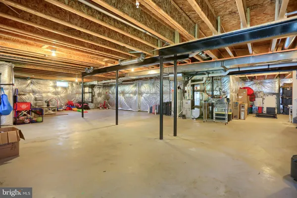 a view of an outdoor sitting area with furniture