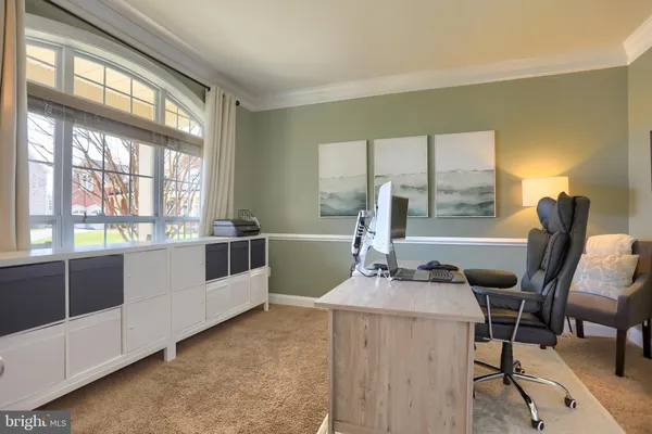 a living room with a couch and a table