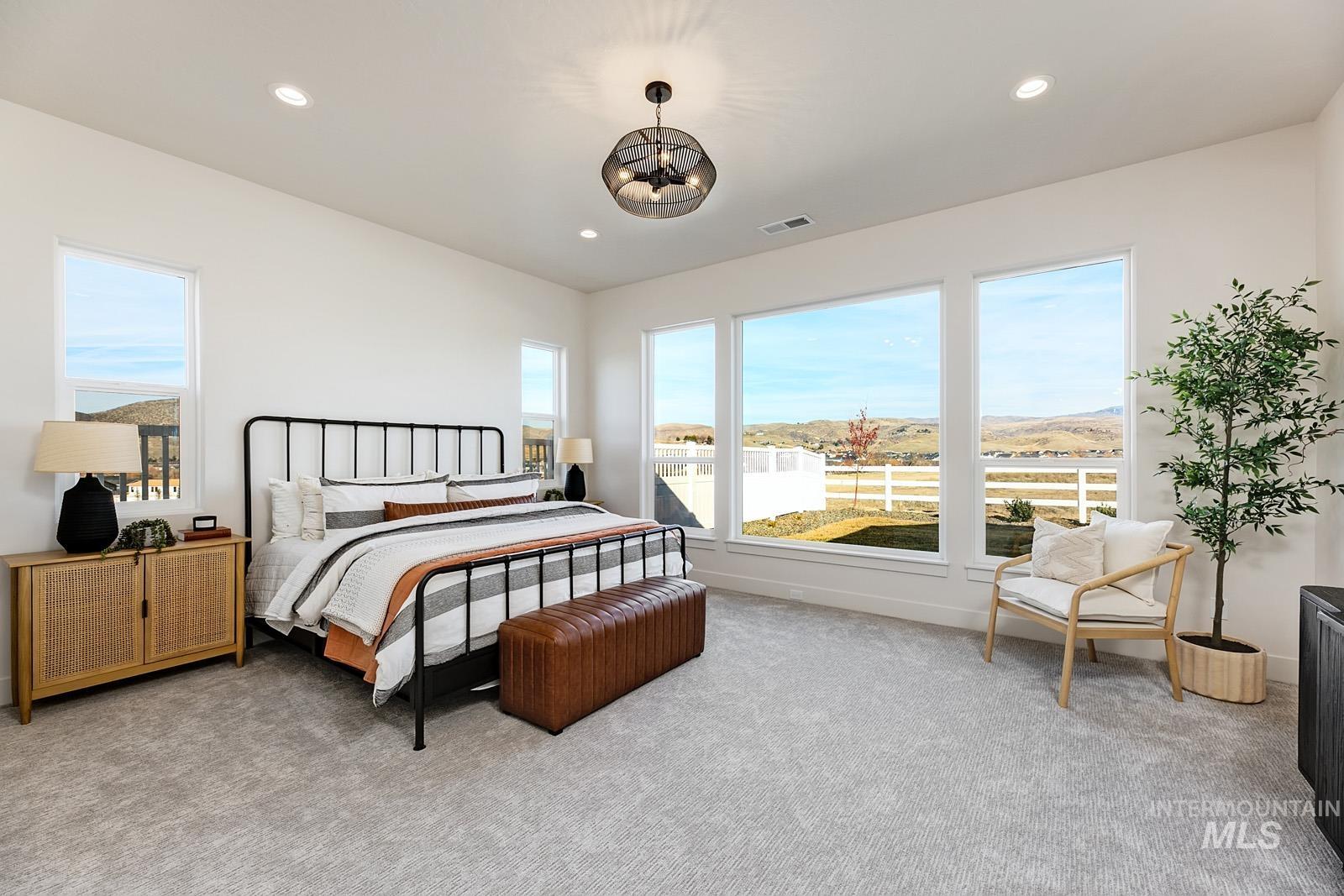 13660 North Spring Creek Way Boise, ID 83714 - Photo 13 of 42 Carpeted bedroom featuring recessed lighting