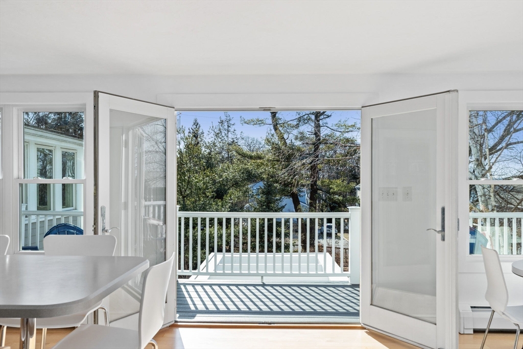 189 Wompatuck Road Hingham, MA 02043 - Photo 13 of 40 a bedroom with a bed and a window