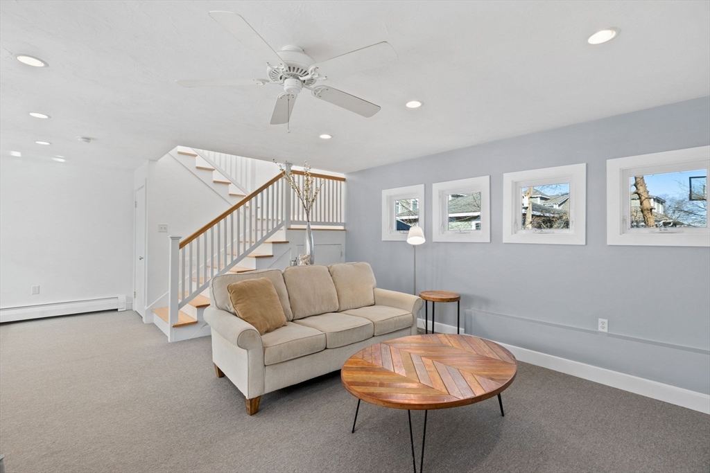 189 Wompatuck Road Hingham, MA 02043 - Photo 26 of 40 a living room with furniture and a potted plant