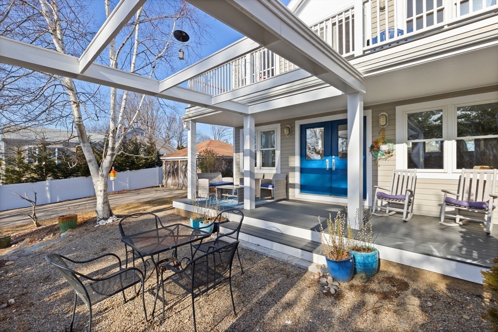 189 Wompatuck Road Hingham, MA 02043 - Photo 31 of 40 a view of a swimming pool with outdoor seating