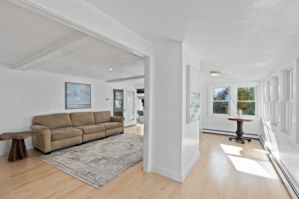 189 Wompatuck Road Hingham, MA 02043 - Photo 5 of 40 a living room with furniture and windows