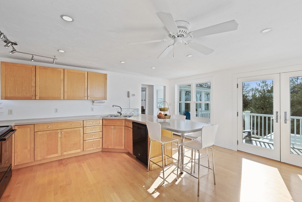 189 Wompatuck Road Hingham, MA 02043 - Photo 10 of 40 a kitchen with stainless steel appliances granite countertop a sink and cabinets