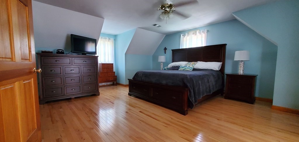 332 Lower Hampden Road Monson, MA 01057 - Photo 14 of 30 a bedroom with a bed and a television