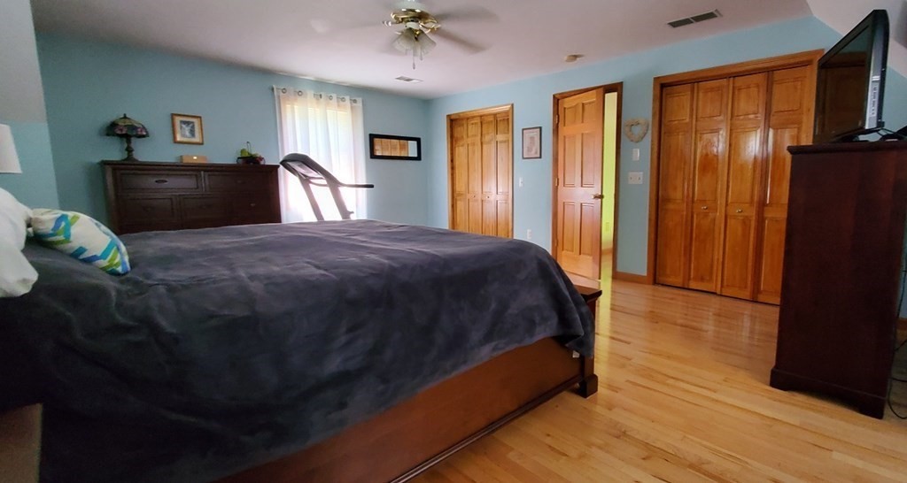 332 Lower Hampden Road Monson, MA 01057 - Photo 17 of 30 a bedroom with a bed dresser and a window