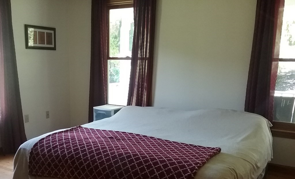 332 Lower Hampden Road Monson, MA 01057 - Photo 20 of 30 a bedroom with a bed and a window