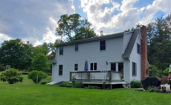 332 Lower Hampden Road Monson, MA 01057 - Photo 4 of 30 a front view of a house with a garden