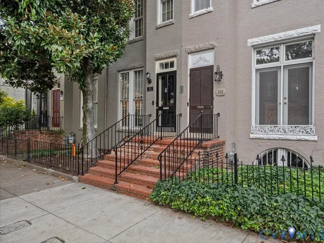 a view of a house with a garden