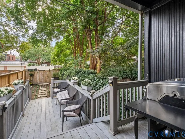 a view of a chairs and table on the wooden floor