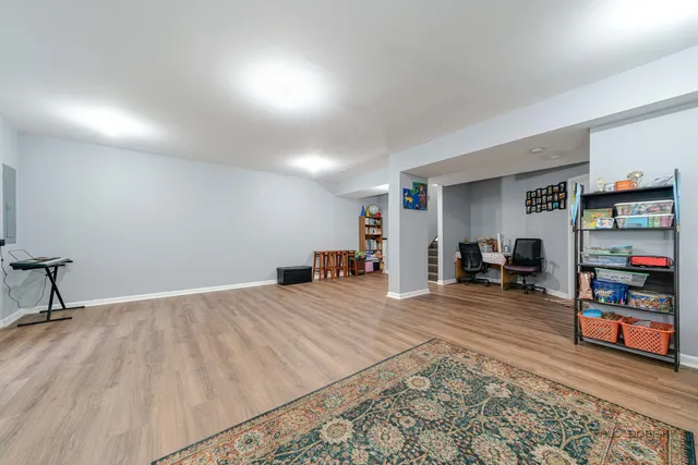 a room with furniture and a wooden floor