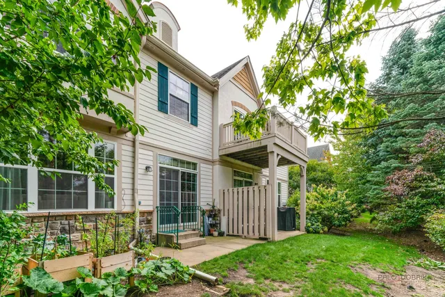 a house with a tree in front of it