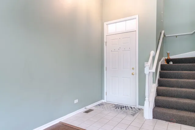 a view of entryway with stairs