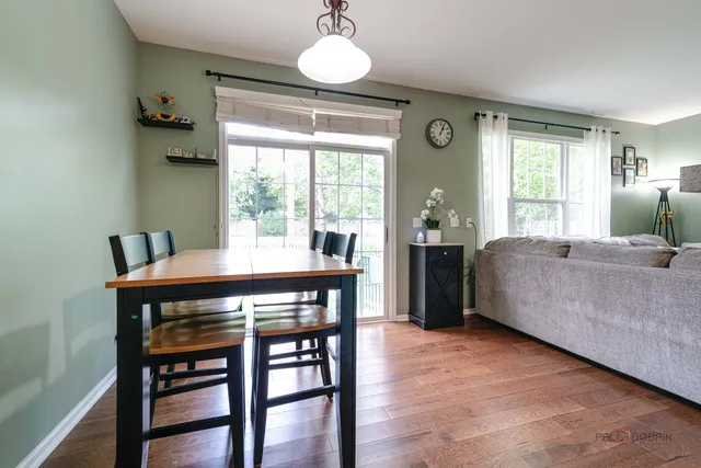 a bedroom with a bed and a table