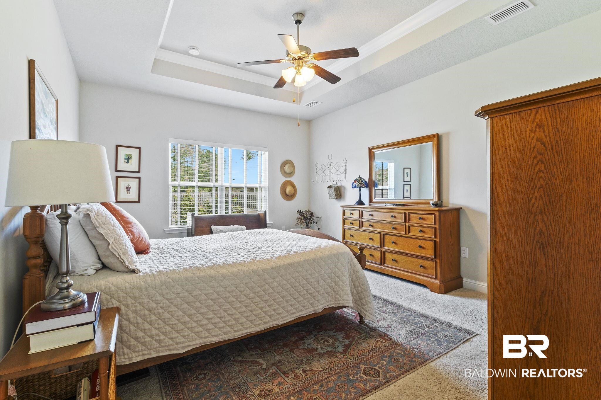31663 Kestrel Loop Daphne, AL 36527 - Photo 36 of 86 Carpeted bedroom featuring a raised ceiling and ceiling fan