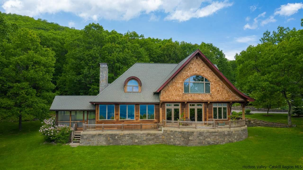 9 Torrens Hook Road, Unit DANCING ROCK Shokan, NY 12481 - Photo 1 of 23 a front view of a house with a yard